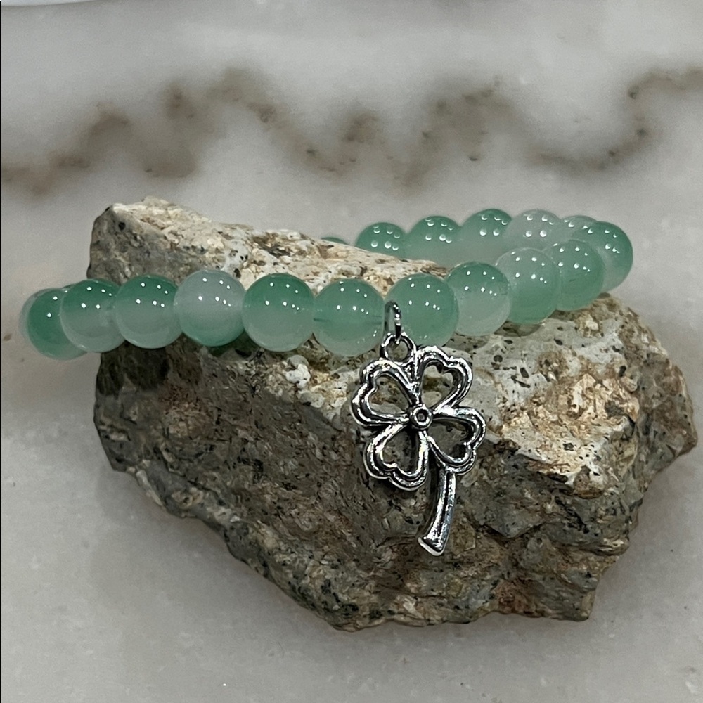 Green Beaded Bracelet with Silver Four Leaf Clover Charm